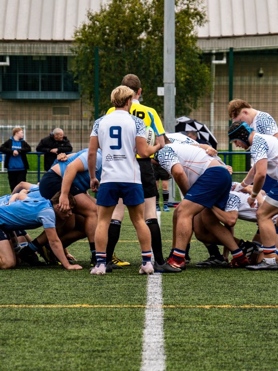 Rugby team in a scrum during a match
