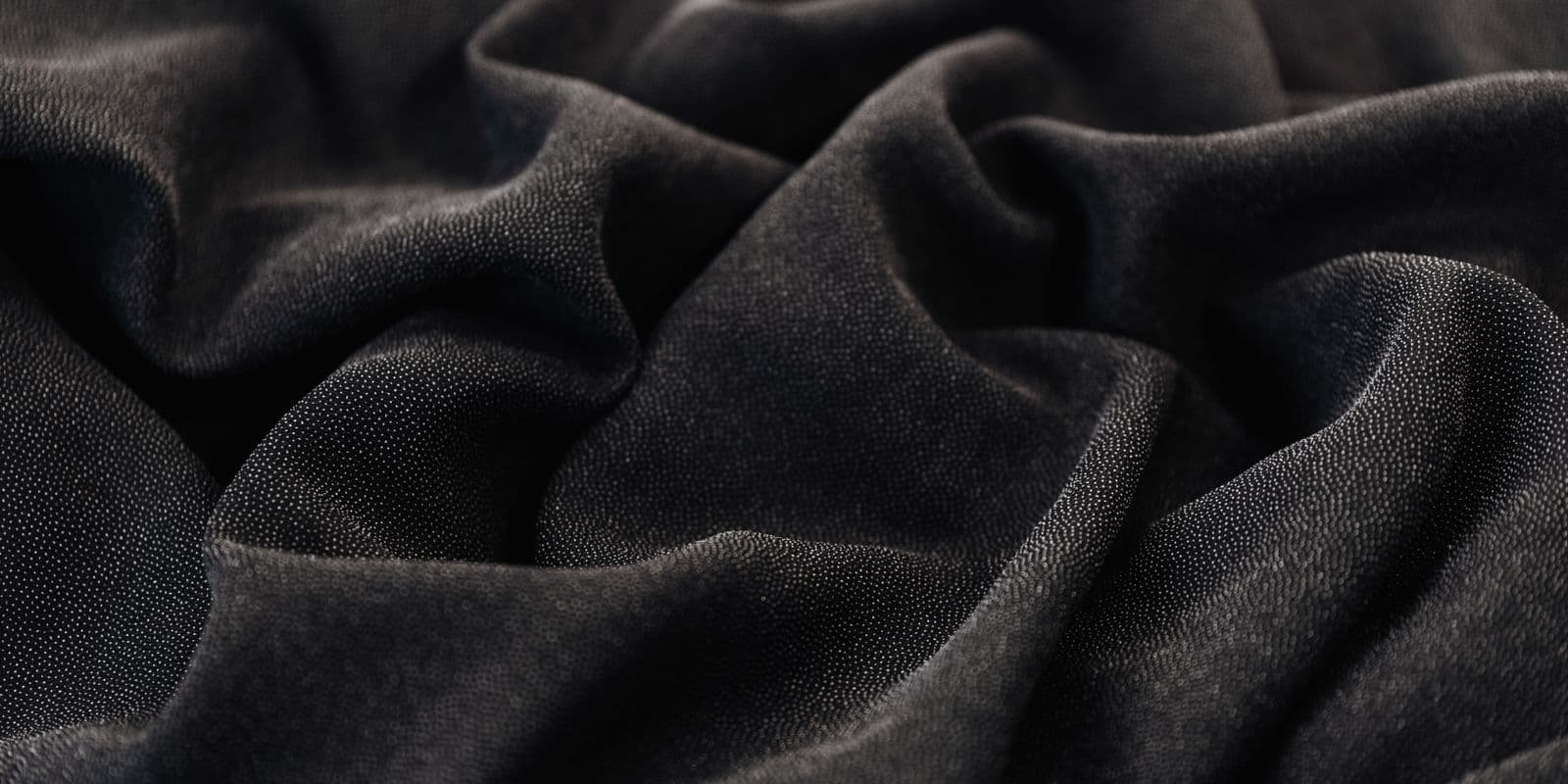 Dark charcoal stretch knit jersey in soft folds