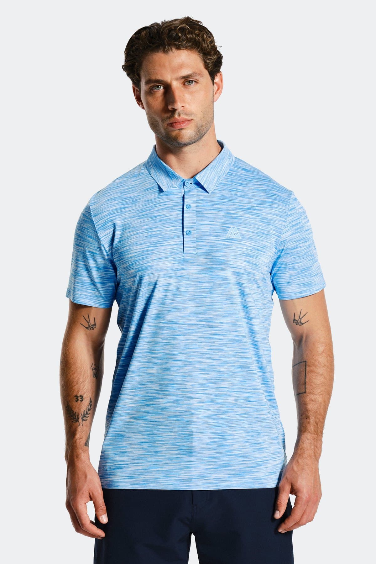 Male model in a blue spacedye performance polo
