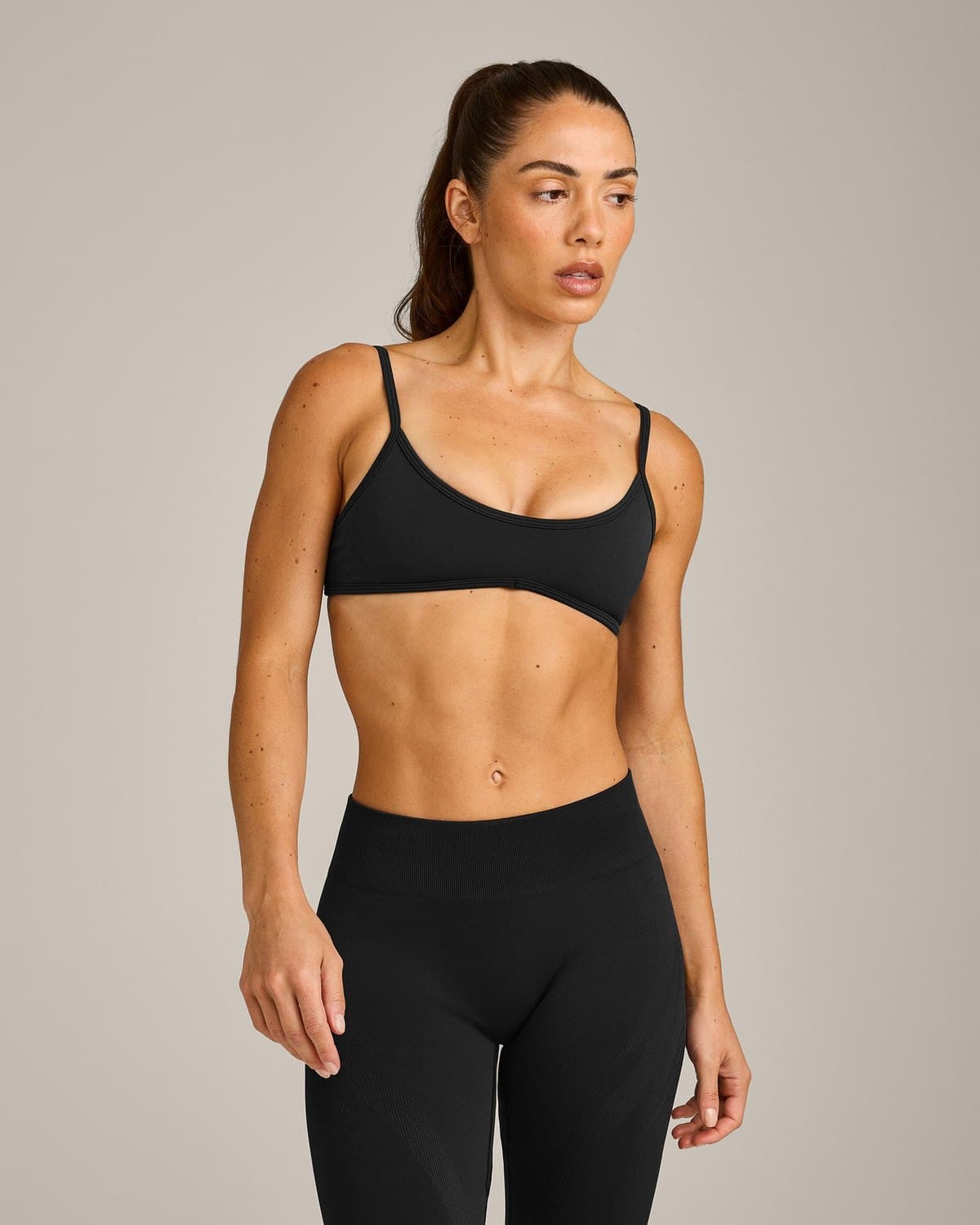 Female model in a black seamless set