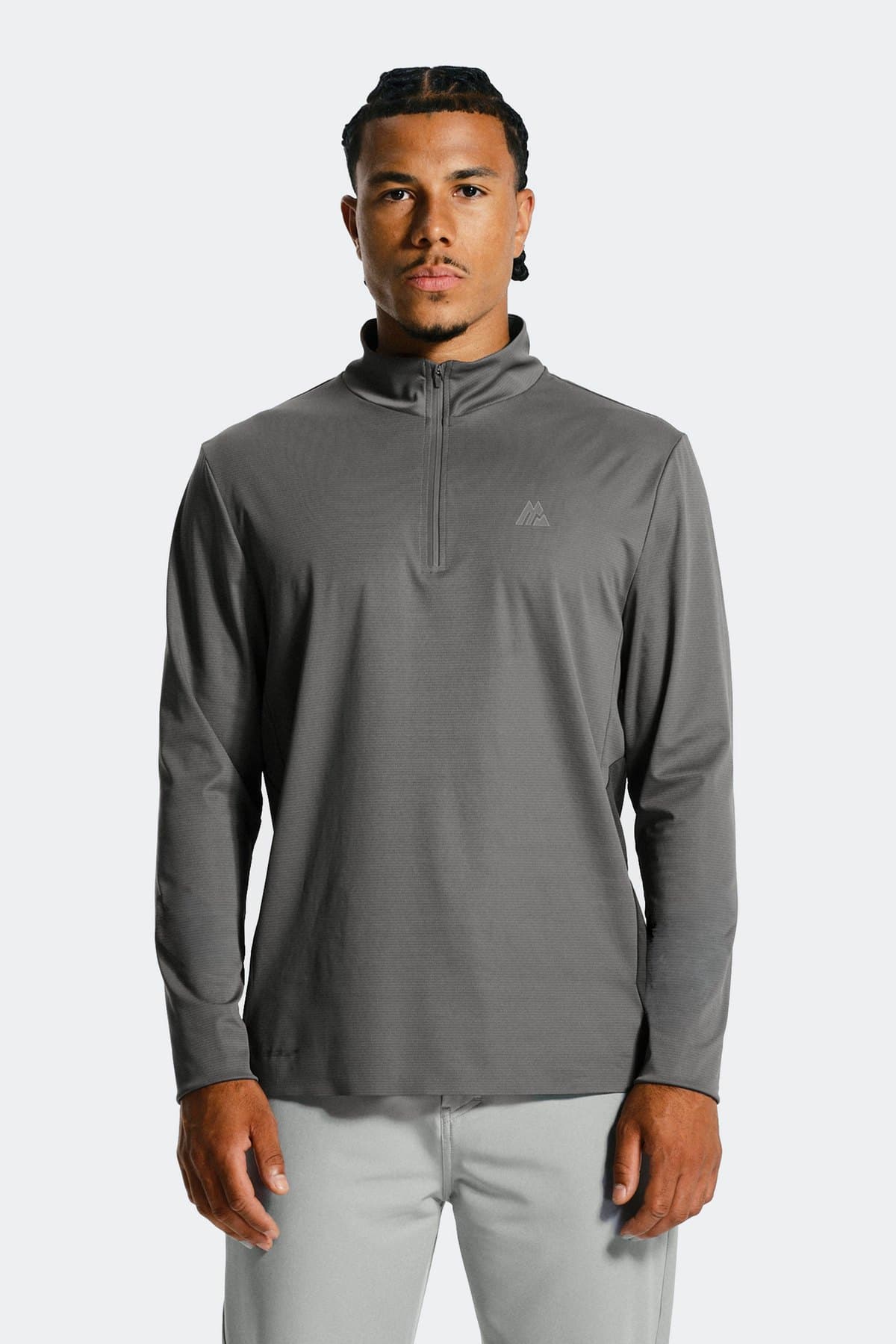 Male model in a grey thermal quarter-zip base layer