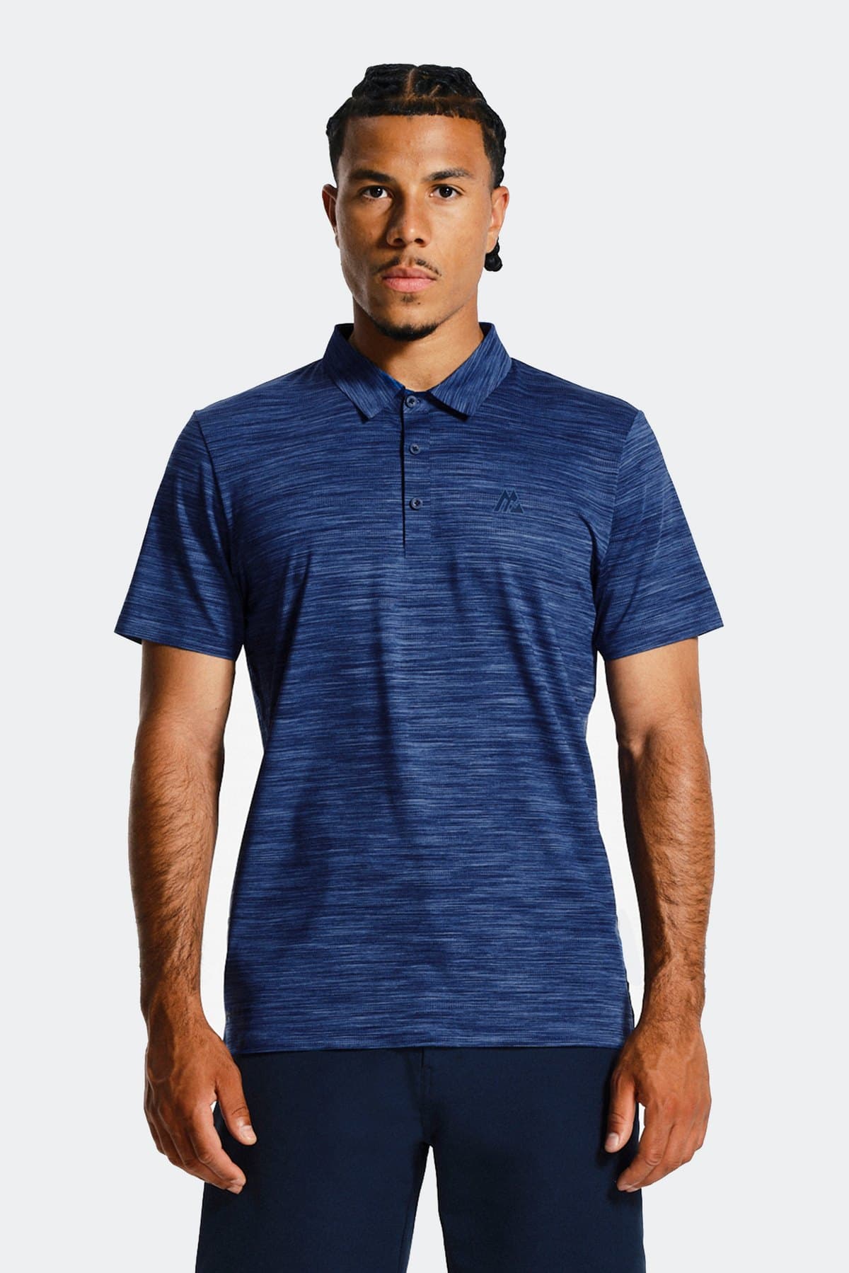 Male model in a navy spacedye performance polo