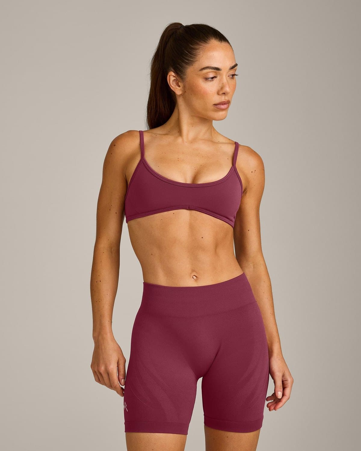 Female model in a berry seamless set