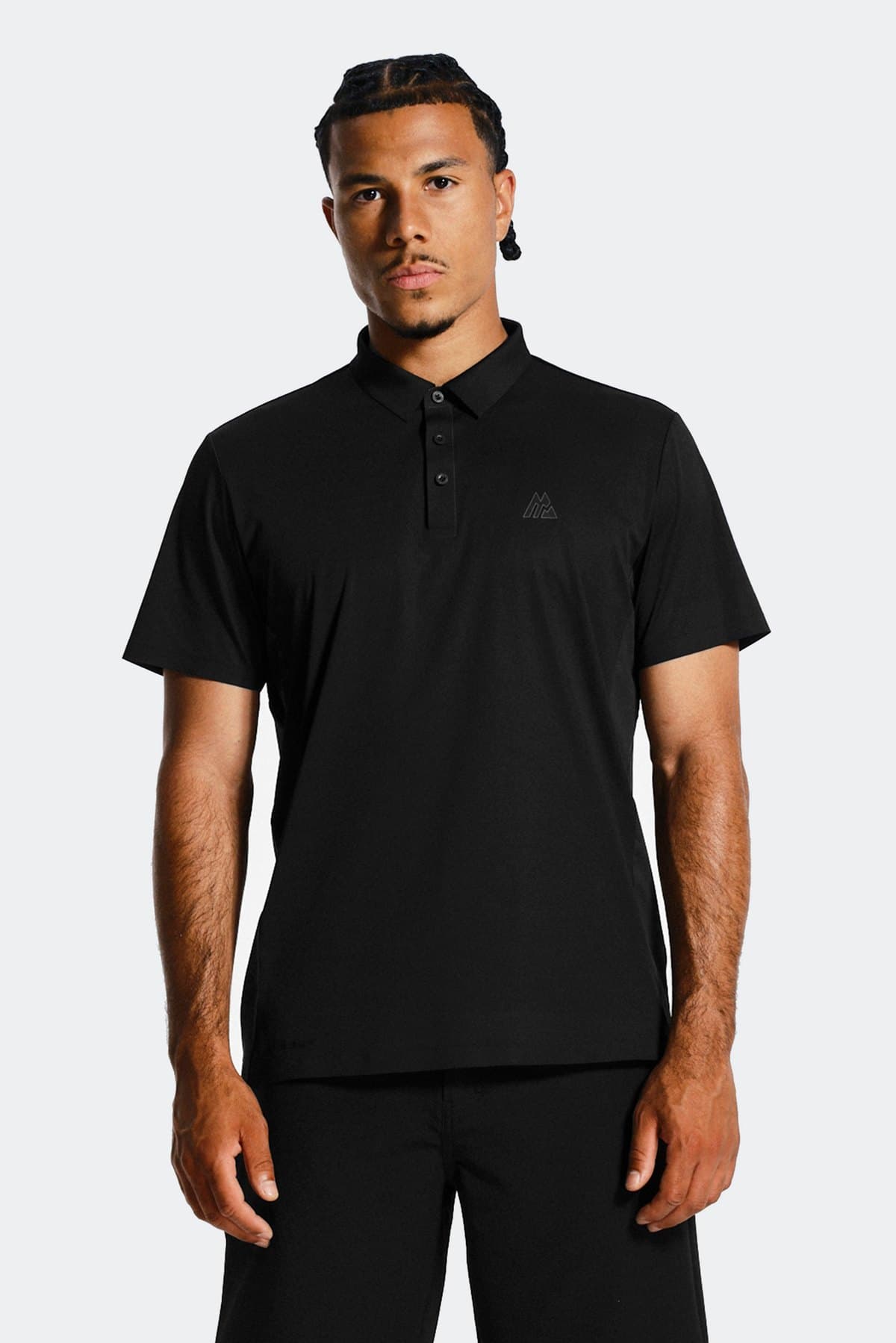 Male model in a black technical polo
