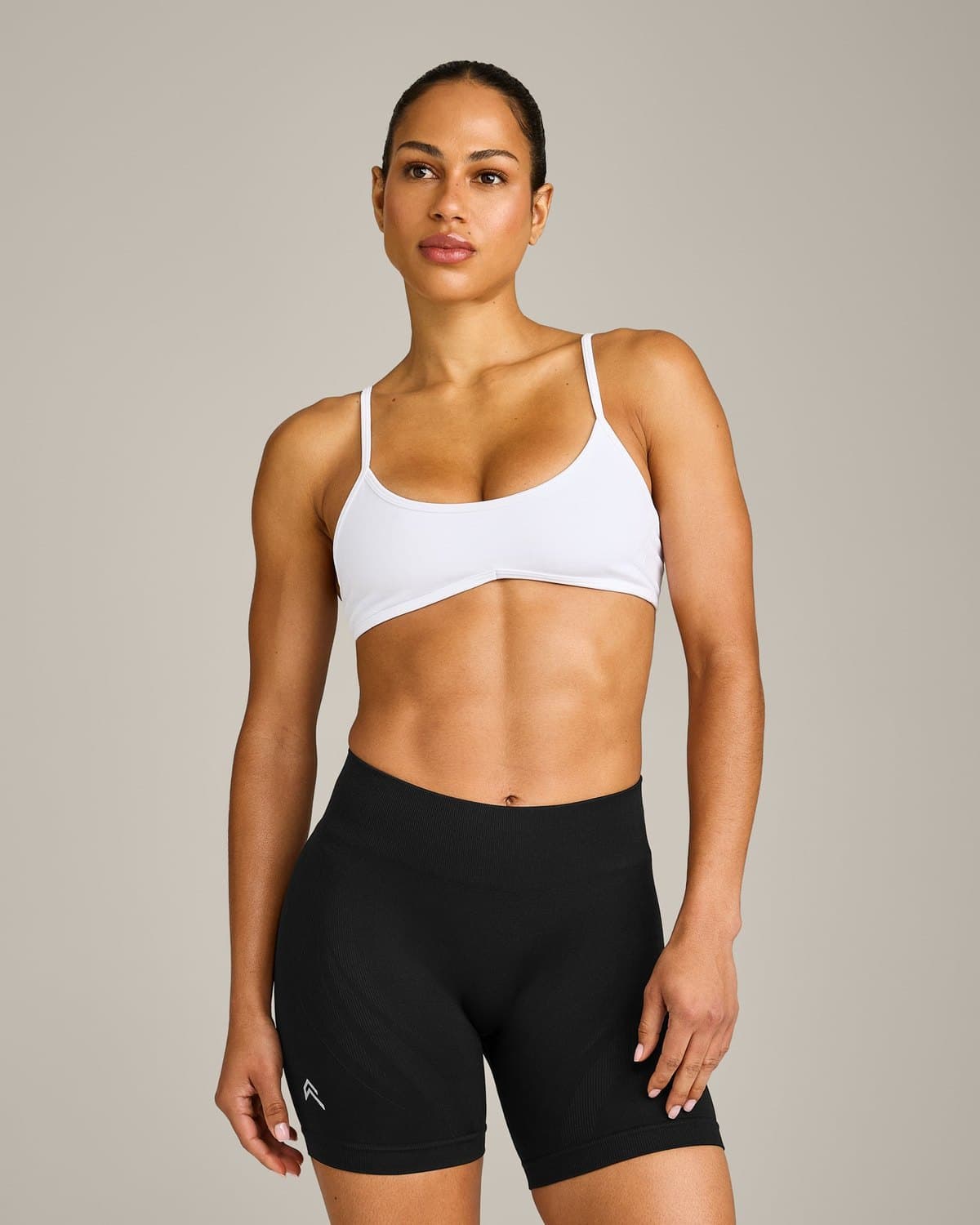 Female model in a white seamless bralette