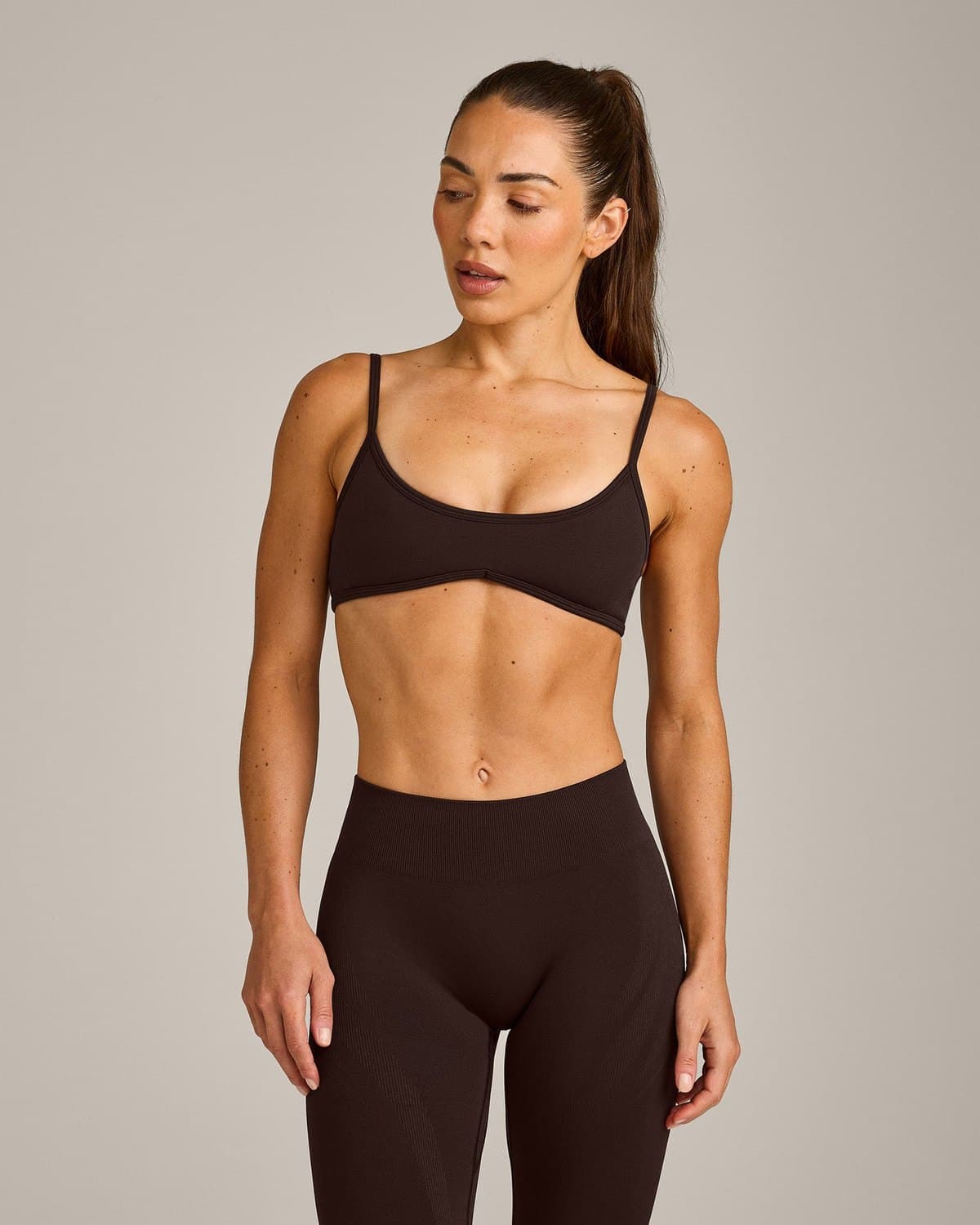 Female model in an espresso seamless set
