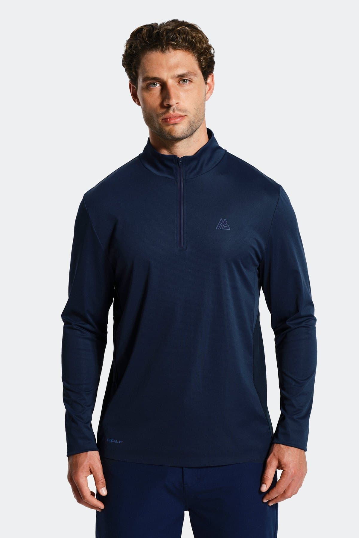 Male model in a navy thermal quarter-zip base layer