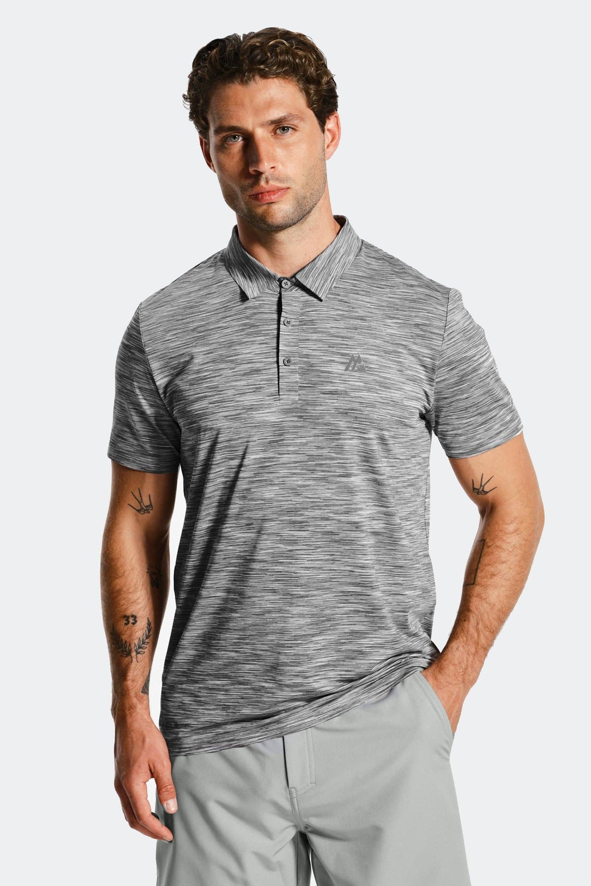 Male model in a grey spacedye performance polo