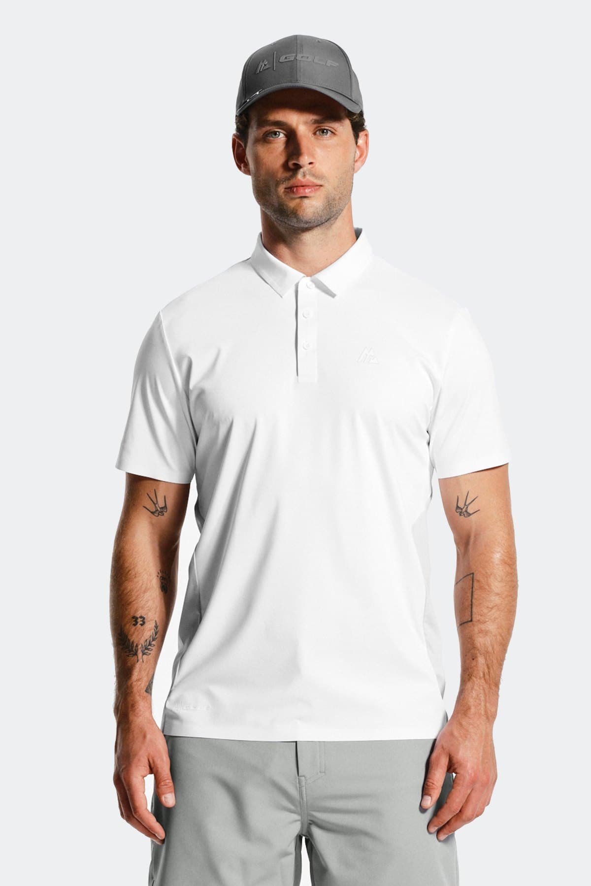 Male model in a white technical polo