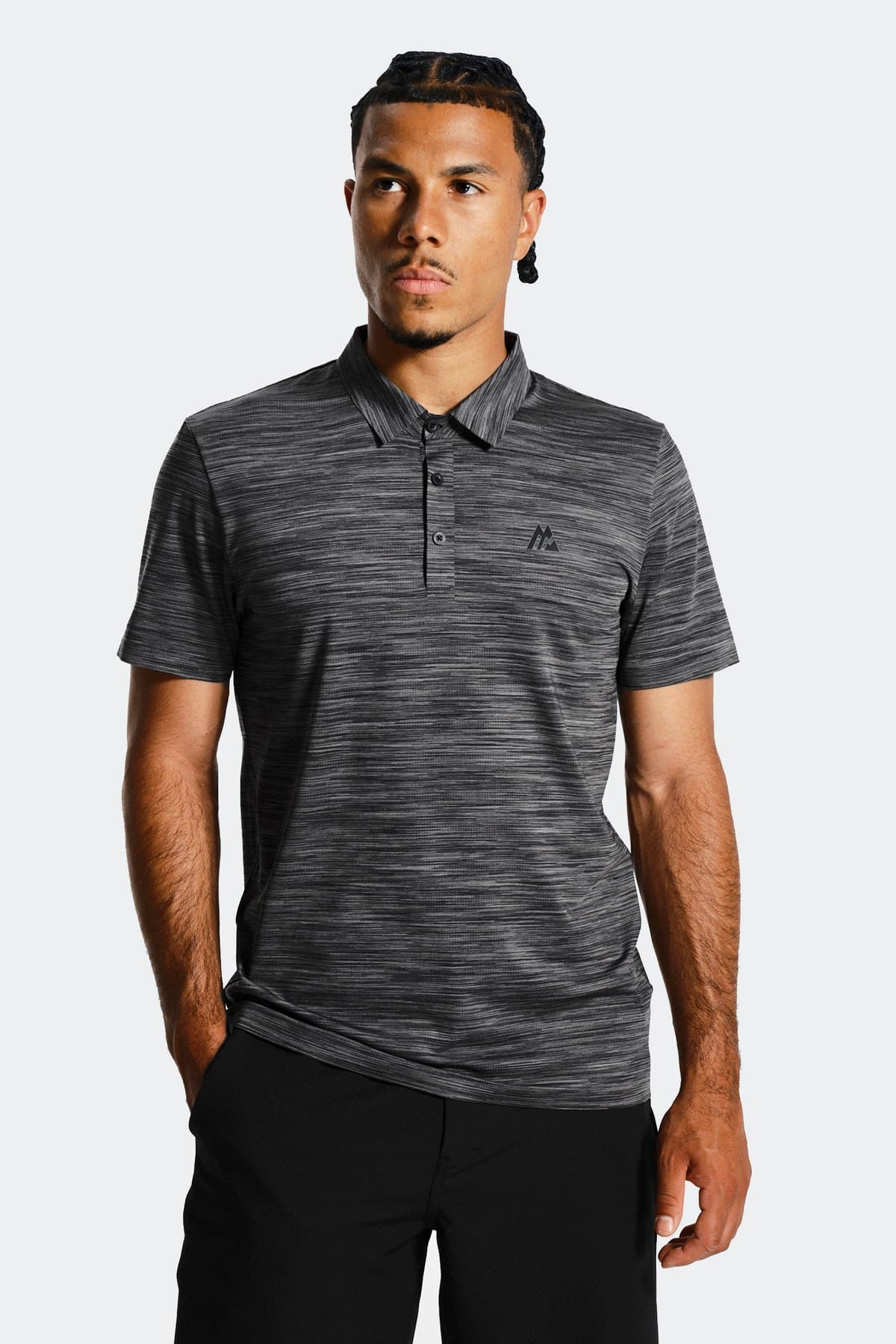 Male model in a charcoal spacedye performance polo