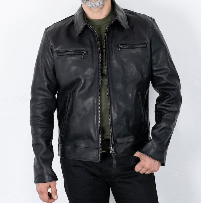 Model in a black horsehide riders jacket