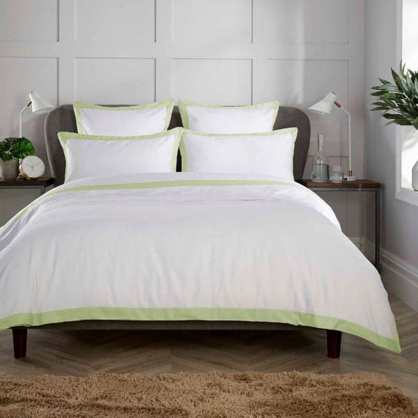 White duvet set with sage green banded edge