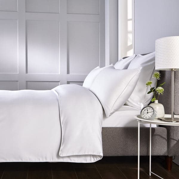 White piped edge duvet set with white trim