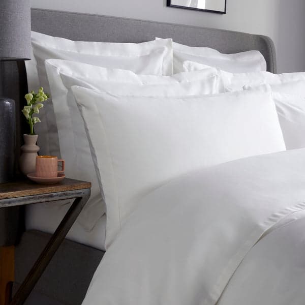 White pillowcase with wide woven border