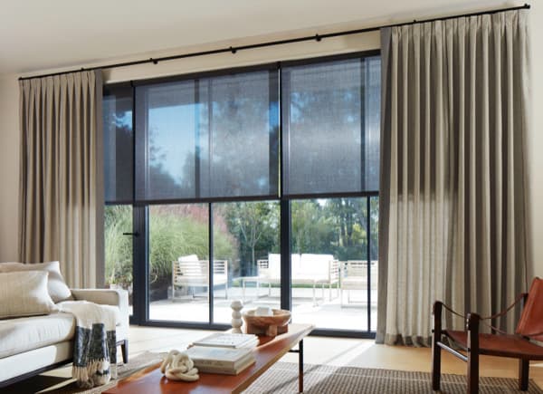 Wool-blend inverted-pleat drapes in a living room