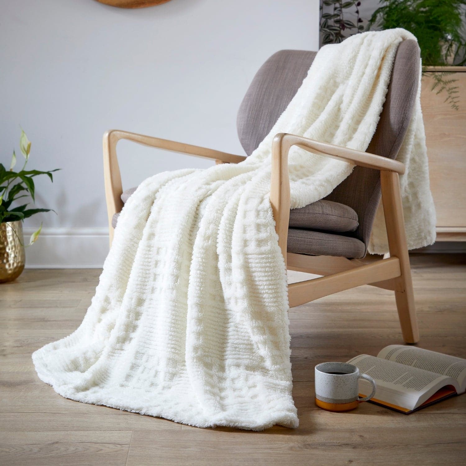 Off-white checkerboard textured throw