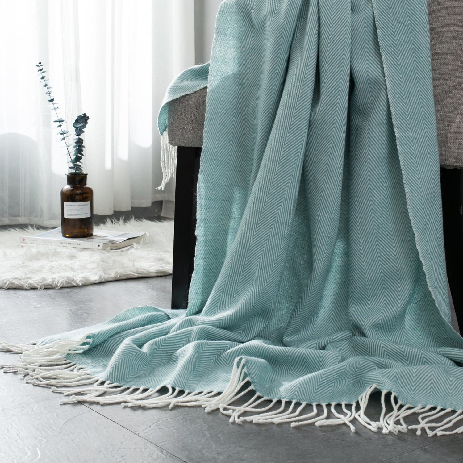 Aqua woven herringbone patterned throw