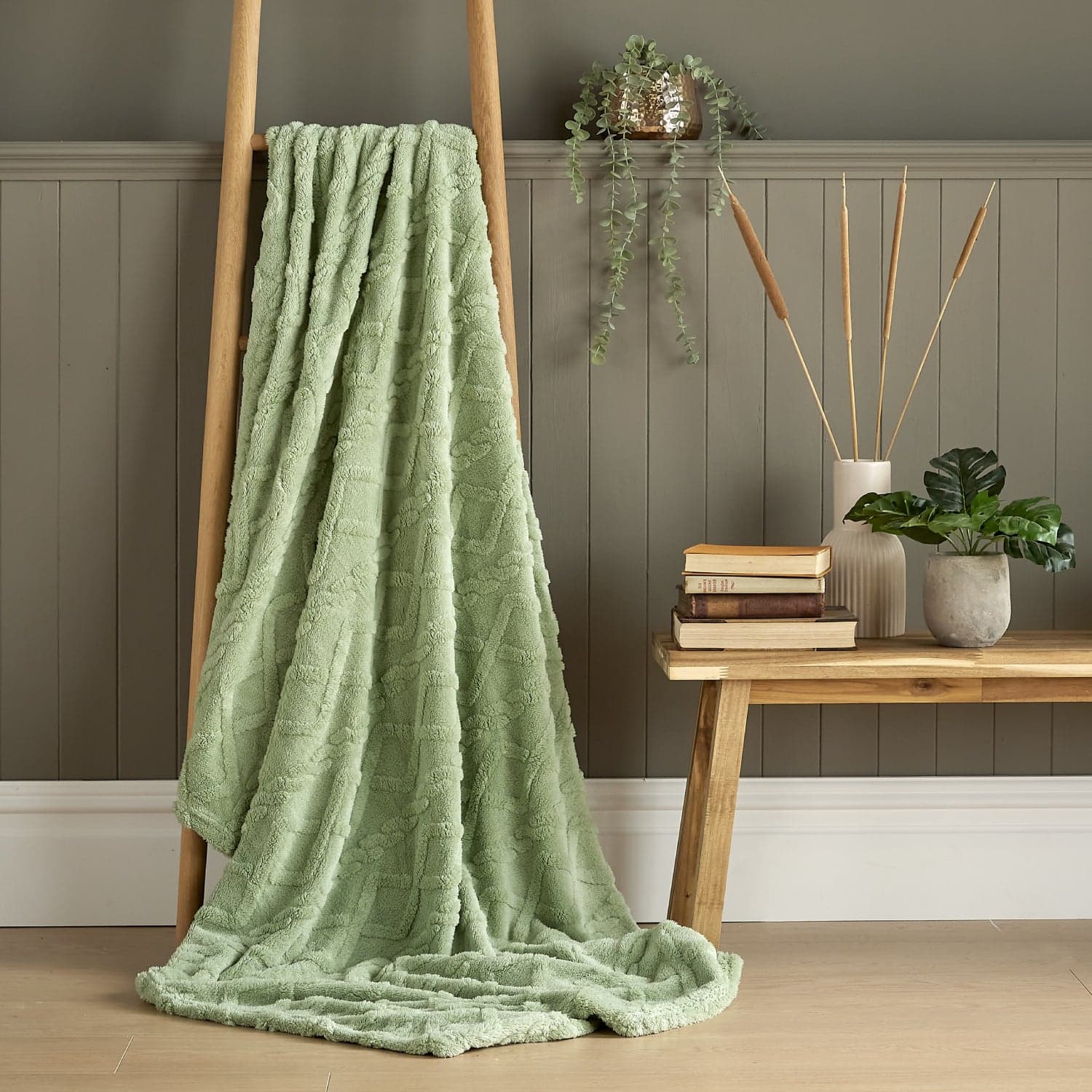 Frosty green cable-knit patterned throw