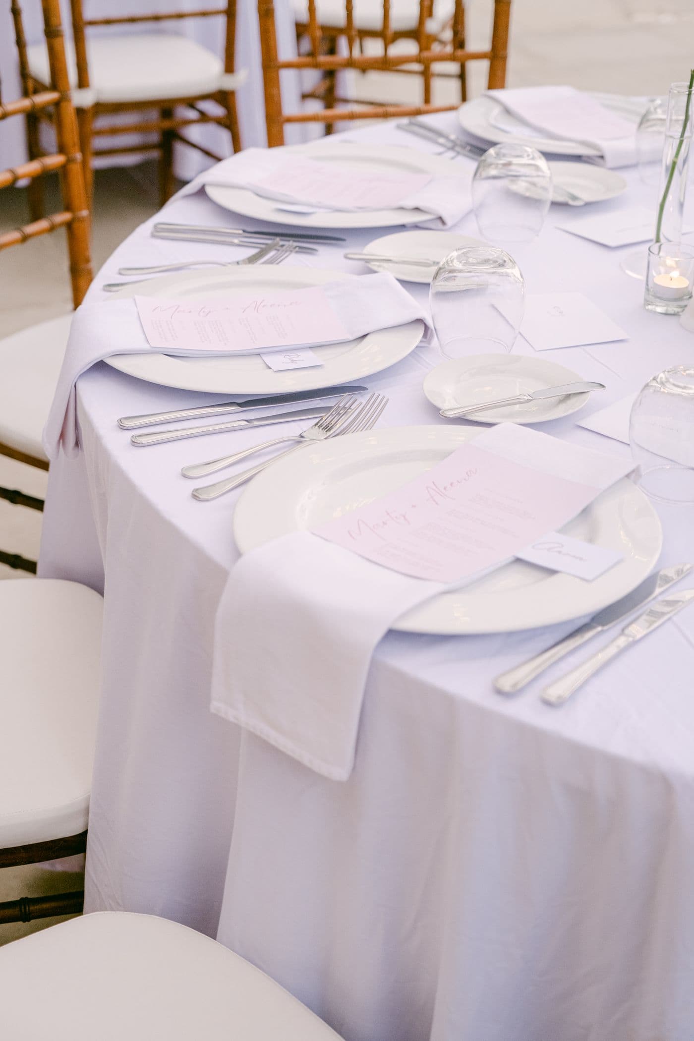 A banquet table dressed in crisp white linen