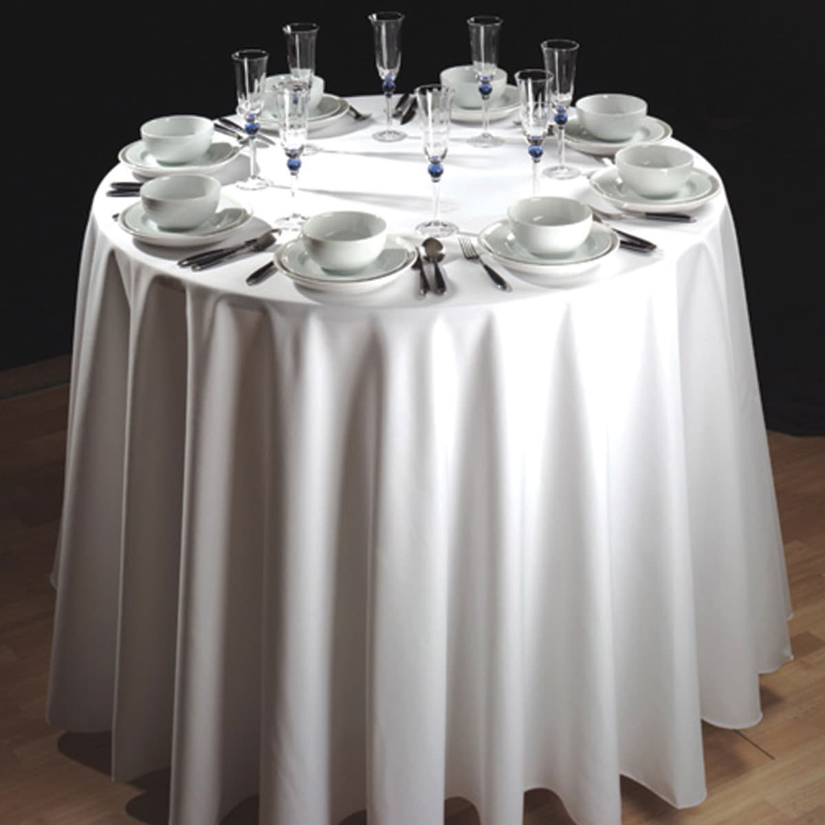 Plain white circular polyester tablecloth