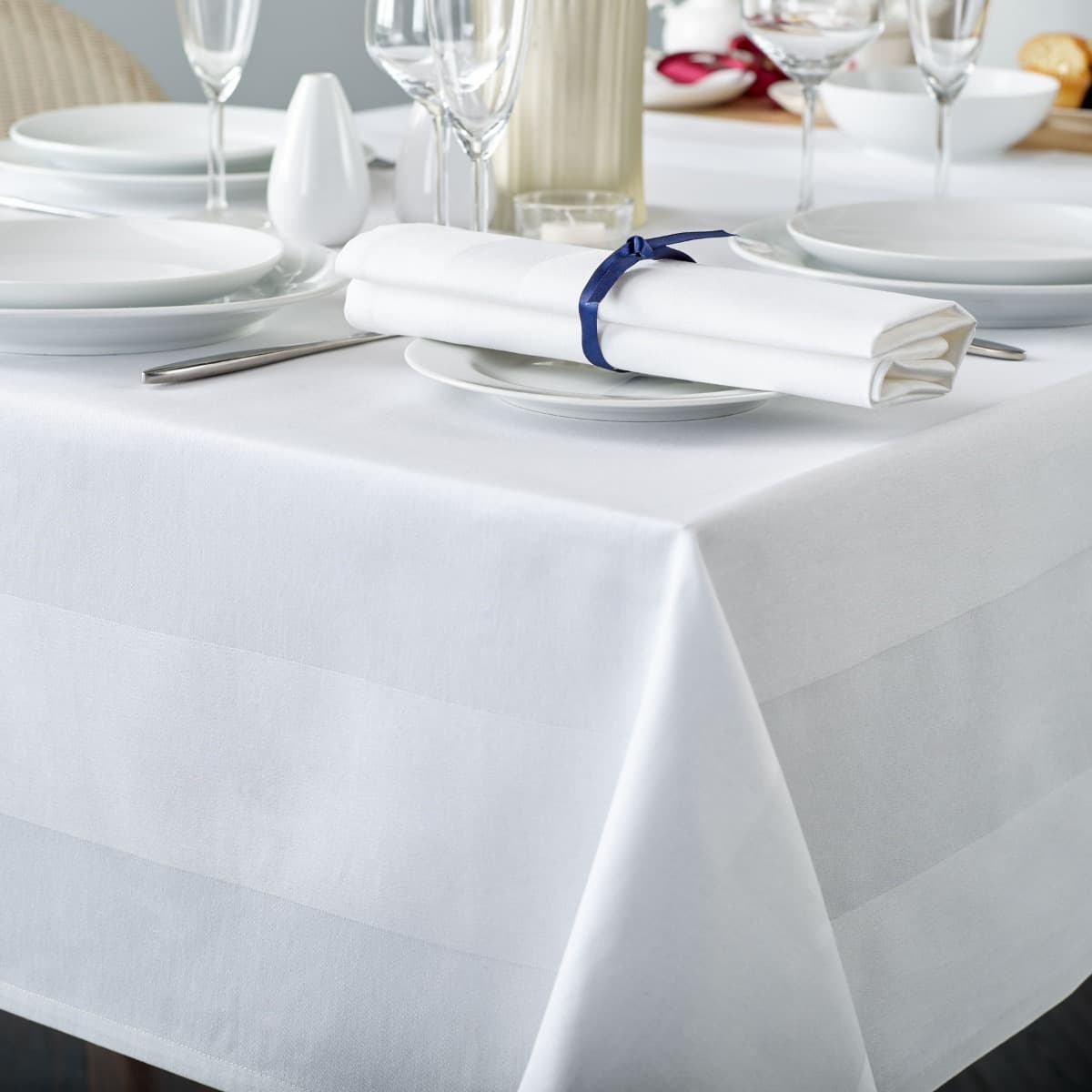 White mercerised cotton tablecloth with a satin band