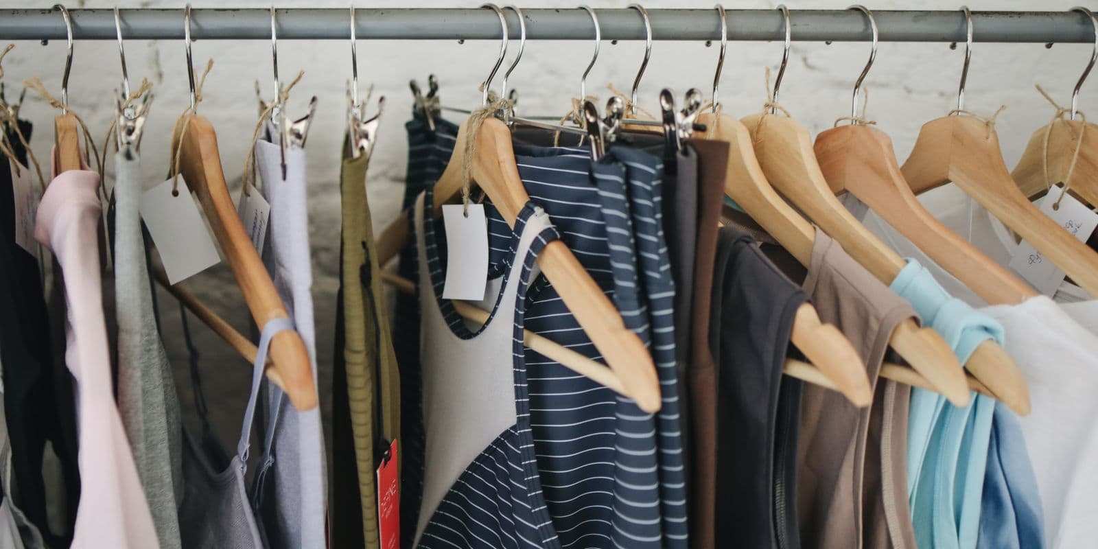 A rail of hung activewear and training tops