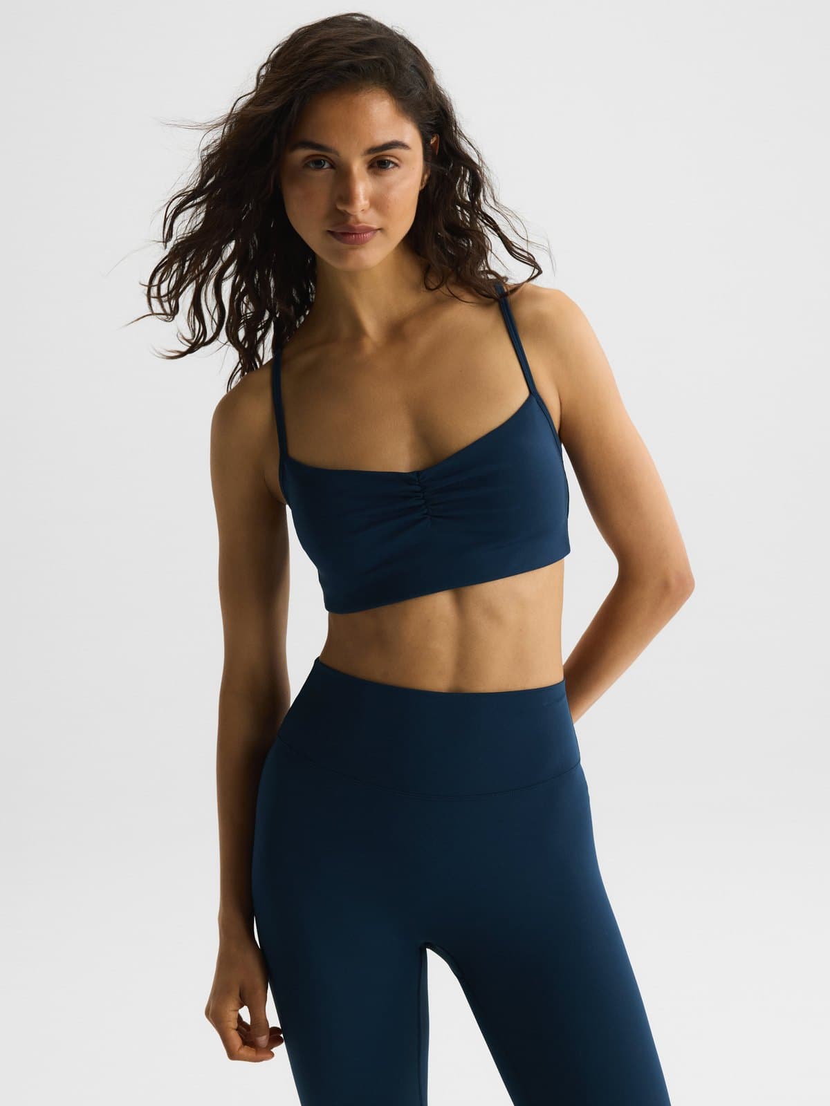 Ultimate Ruched Open Back activewear on a model