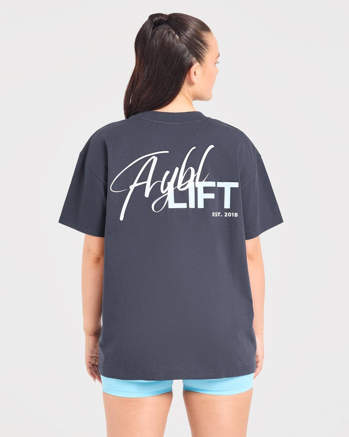 Navy oversized lift-graphic training tee on model