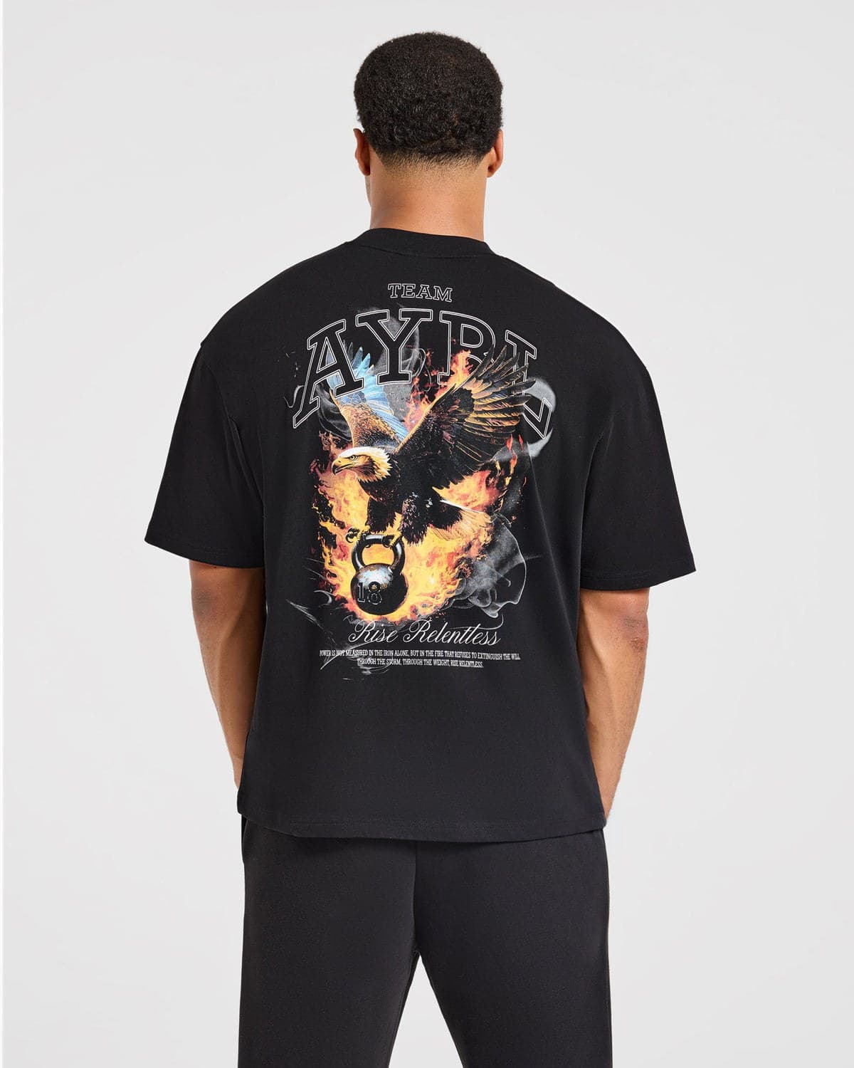 Black oversized performance tee on model