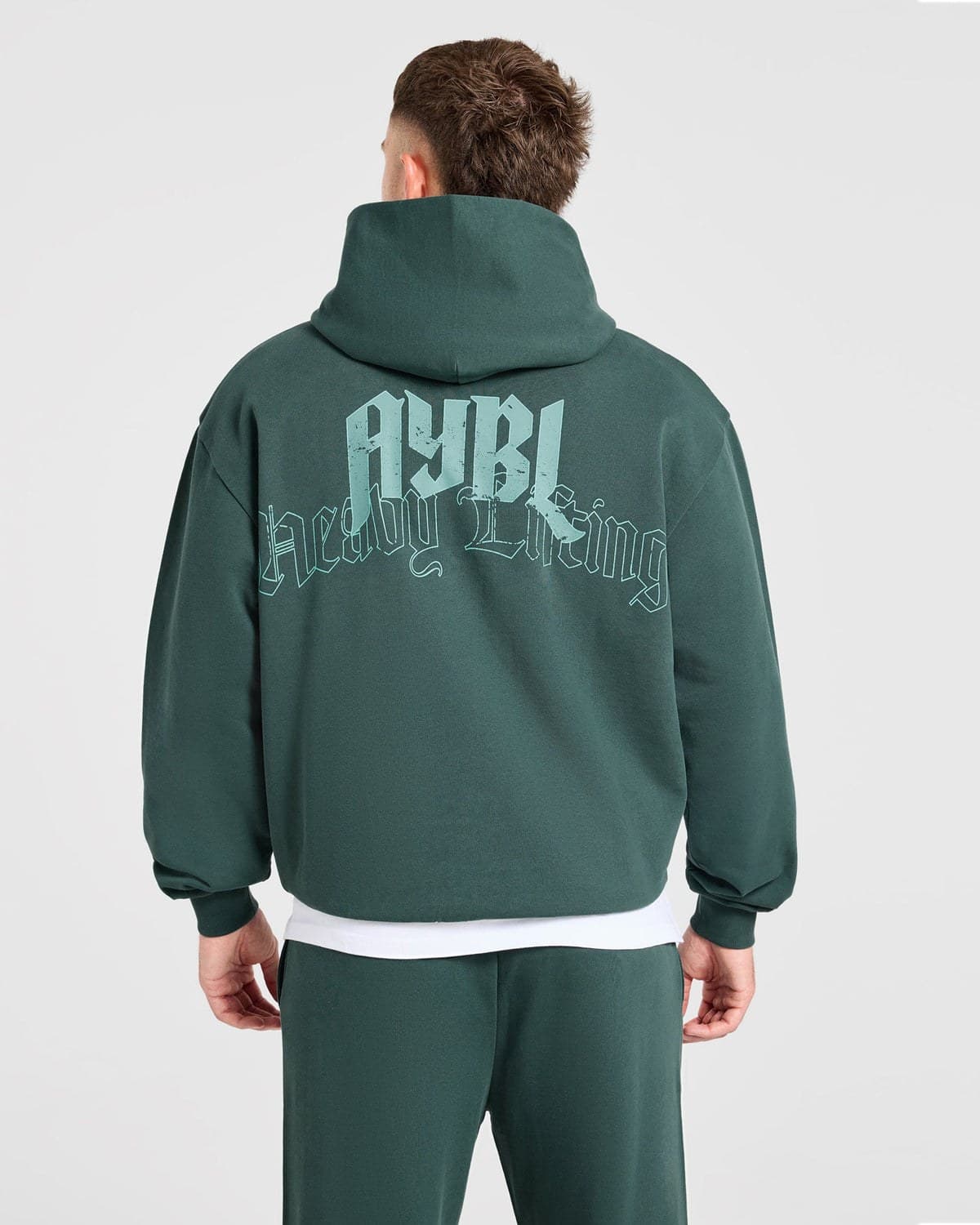 Teal oversized training hoodie on model