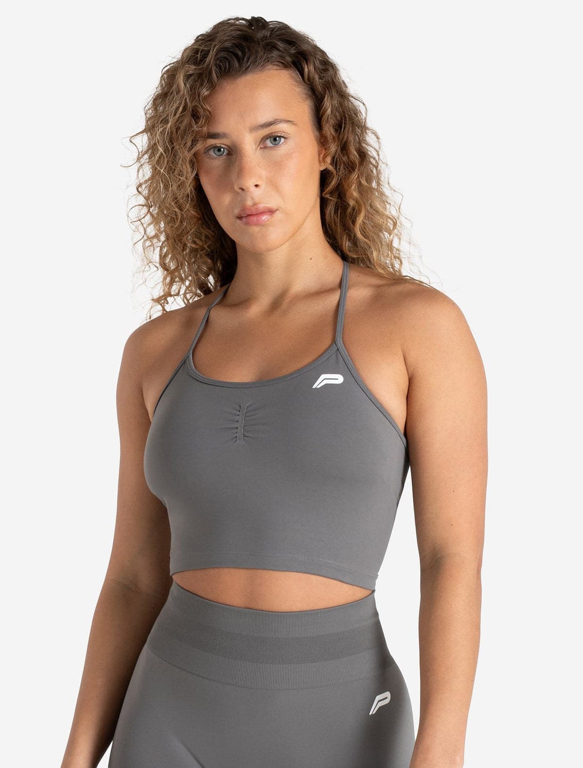 Mid grey seamless training bra tank on model