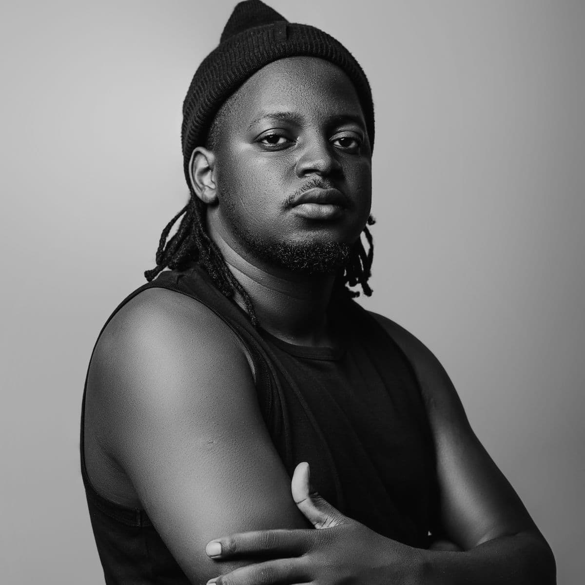 An athlete in a black beanie