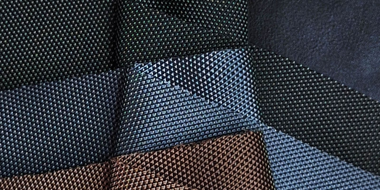 Technical woven fabric swatches in slate and stone